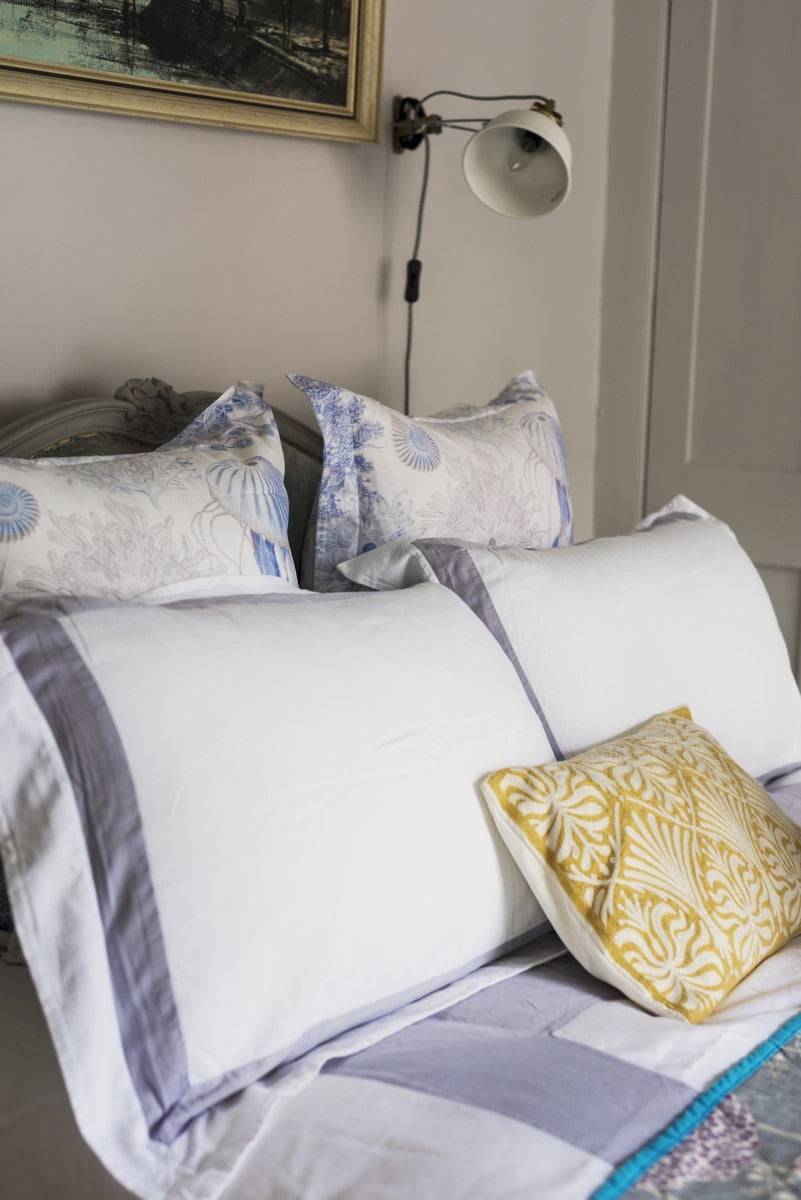 HEALTH WARNING: This post contains shocking images of a dirty old pillow! I'm a poor sleeper and often awake in the small hours. To improve my sleeping habits, I've invested a lot of time and money in creating the perfect bed. This is virtually pointless if you don't get the details right, like choosing the right pillows for you. Here's my essential buyer's guide to picking the correct pillow for you to take you from Awake to Zzzzzzz. Layers of pillows on a bed