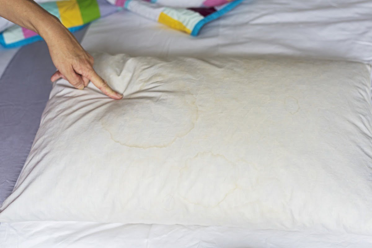 HEALTH WARNING: This post contains shocking images of a dirty old pillow! I'm a poor sleeper and often awake in the small hours. To improve my sleeping habits, I've invested a lot of time and money in creating the perfect bed. This is virtually pointless if you don't get the details right, like choosing the right pillows for you. Here's my essential buyer's guide to picking the correct pillow for you to take you from Awake to Zzzzzzz. Old, dirty pillow