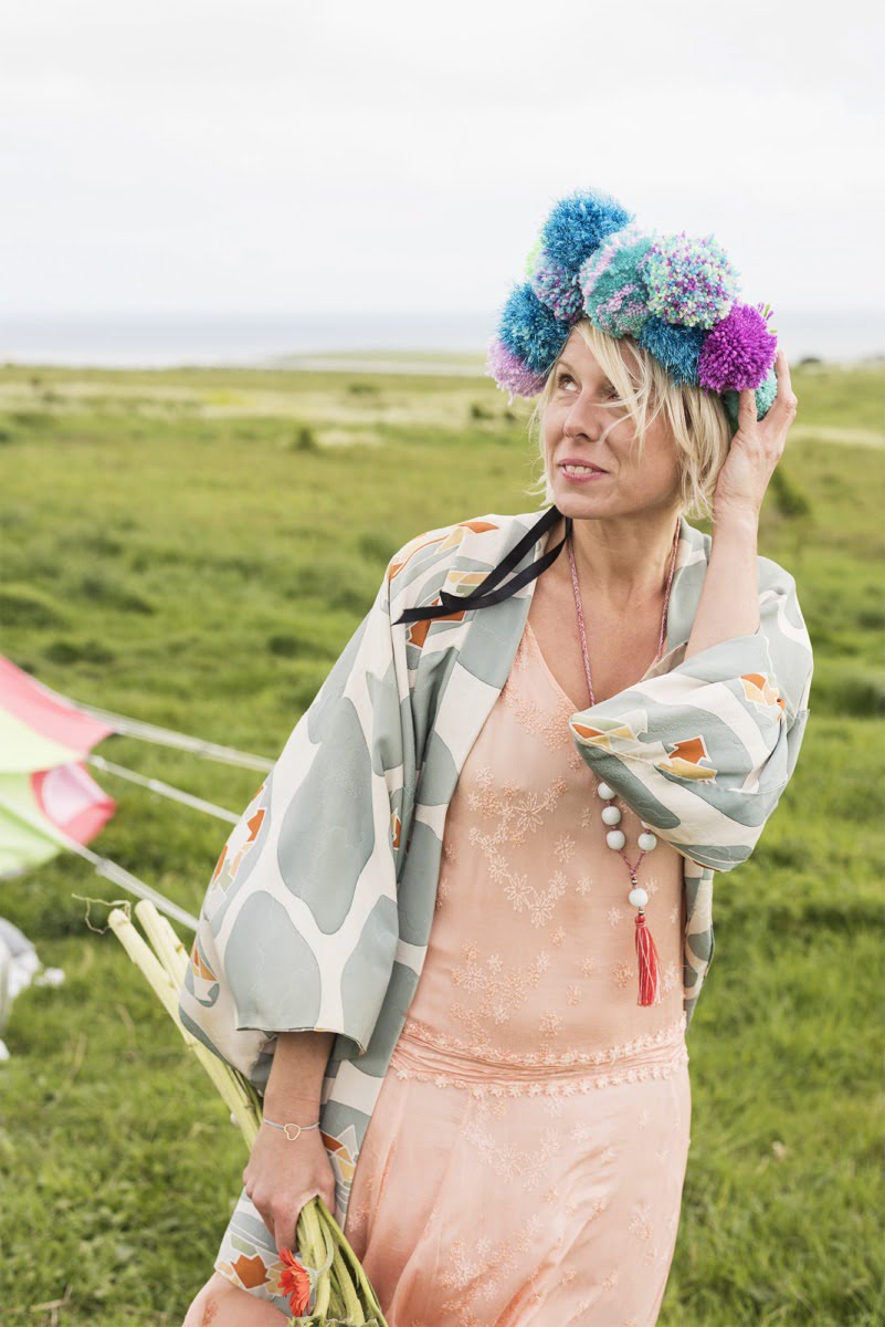 Interior Stylist + Home Blogger Maxine Brady gives her glamping guide - with tips on what to pack and ideas on where to stay. With a Nisi Living giveaway. Maxine with a pom pom headdress