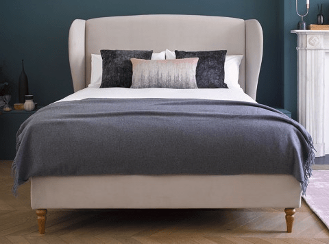 Be the first to see the plans for my bedroom makeover- (hint it has a coral wallpaper!) Upholstered winged bed in linen fabric